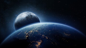 vue de la lune masquée par la terre depuis l'espace