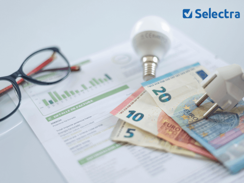 Facture d'énergie avec billets en euros et ampoule, illustrant le chèque énergie 2026
